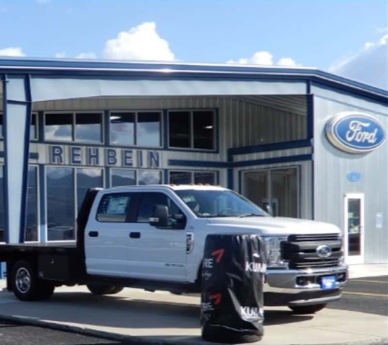 Mechanic holding a tool in the Ford Service Center