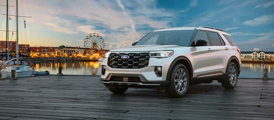 Ford SUV in front of ferris wheel