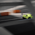 Racecar speeding down an Atlanta, Georgia racing track.