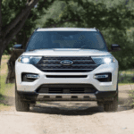 2024 Ford Explorer King Ranch Edition driving on gravel road in Macon, GA.