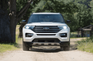 2024 Ford Explorer King Ranch Edition driving on gravel road in Macon, GA.