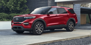 2024 Ford Explorer in red paint parked in a driveway.