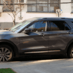 2023 Ford Explorer Limited edition in grey paint parked alongside a street in Macon, GA.
