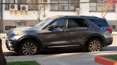 2023 Ford Explorer Limited edition in grey paint parked alongside a street in Macon, GA.