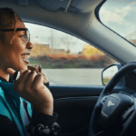 Woman driving with BlueCruise technology in her Ford truck