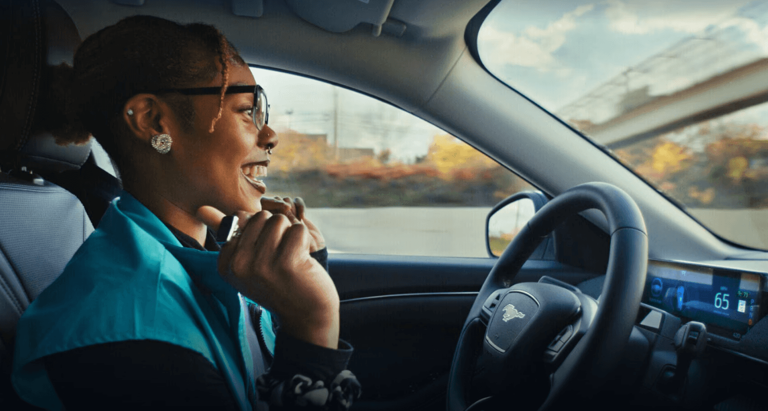 Woman driving with BlueCruise technology in her Ford truck