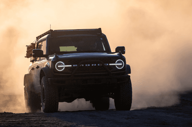 2025 Ford Bronco off-roading in sand dunes.