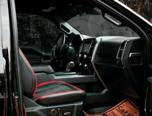 Close up ona Ford vehicle interior leather features.