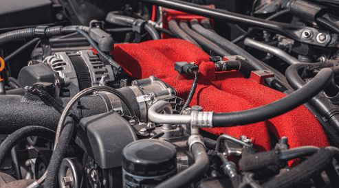 Close up on a Ford engine exposed parts.