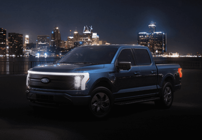 Ford F-150 Lightning Parked in Front of the City