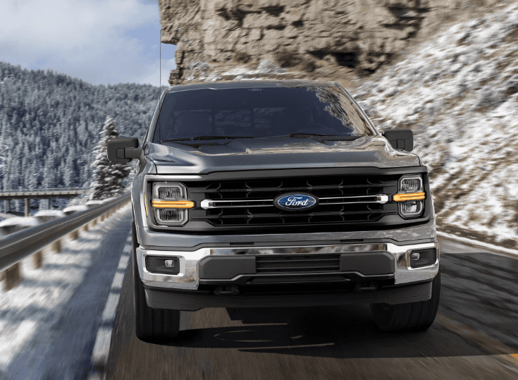 Ford F-150 driving down the road