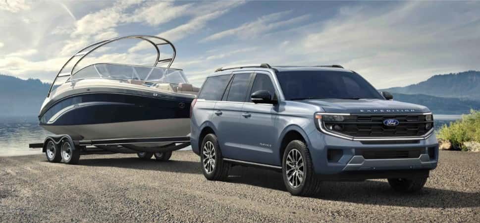 ford expedition towing a boat