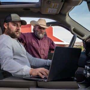 2026 Ford F-150 your arm rest converts to desk space to make working on the jobsite even easier