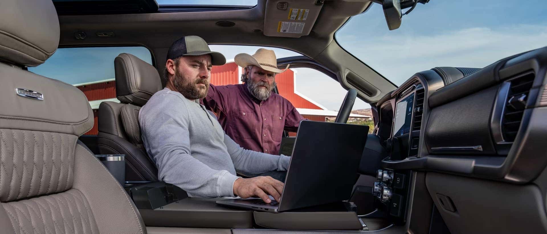 2026 Ford F-150 your arm rest converts to desk space to make working on the jobsite even easier