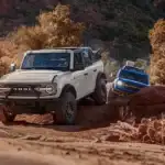 2026 Ford Broncos traversing over rocks hills and dirt roads