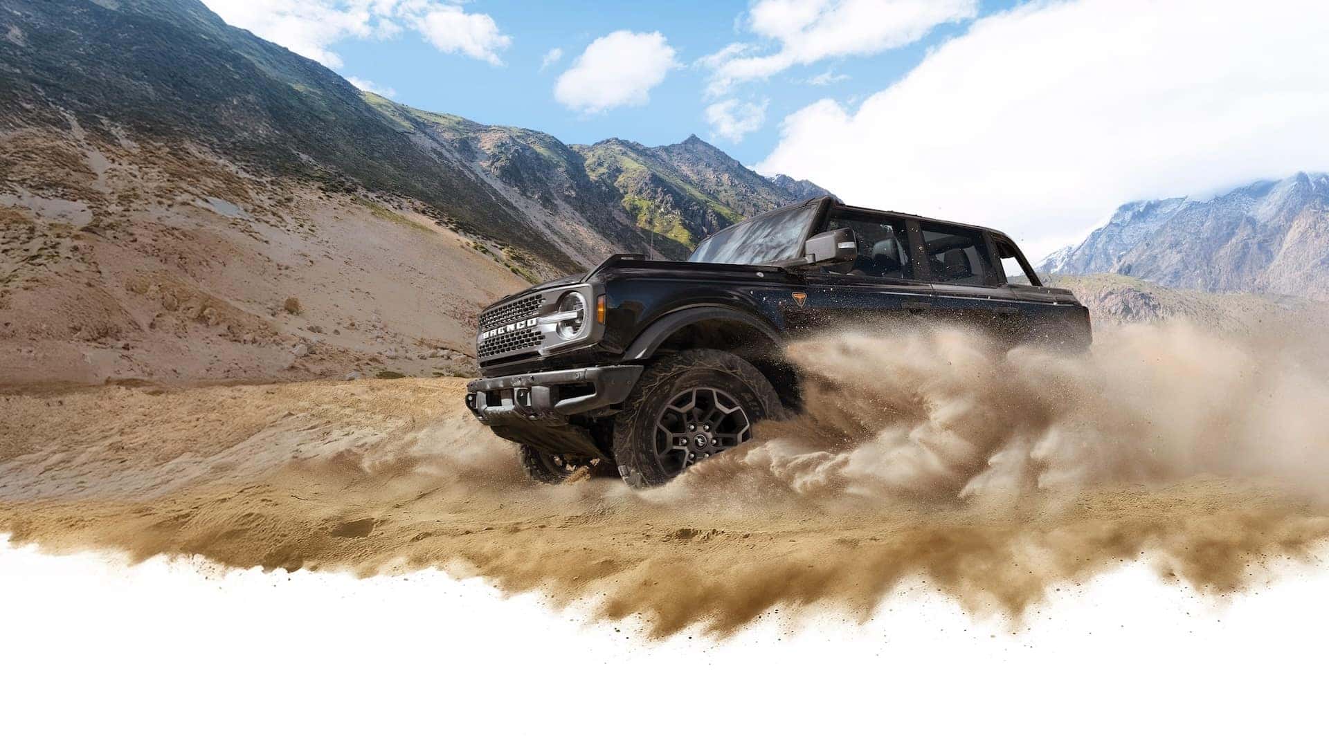 2026 Ford Bronco slinging sand in the desert dunes
