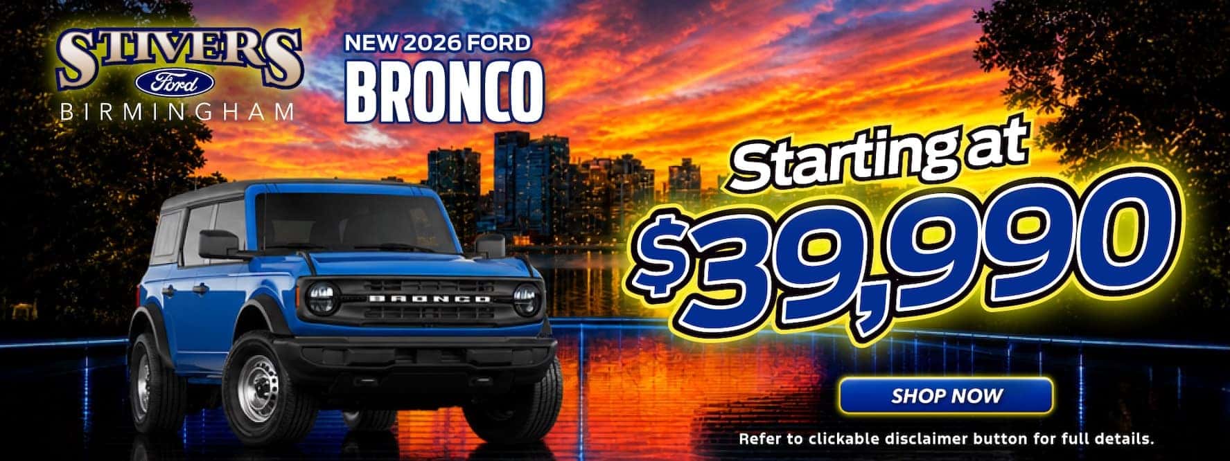 Bronco in front of skyscrapers