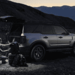 A silver 2023 Ford Bronco Sport Badlands is shown from the side at dusk.