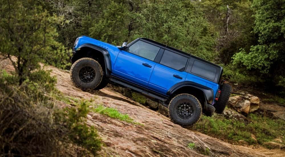A blue 2025 Ford Bronco off-roading