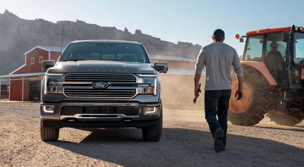 Grey 2026 Ford F-150 Platinum on a farm