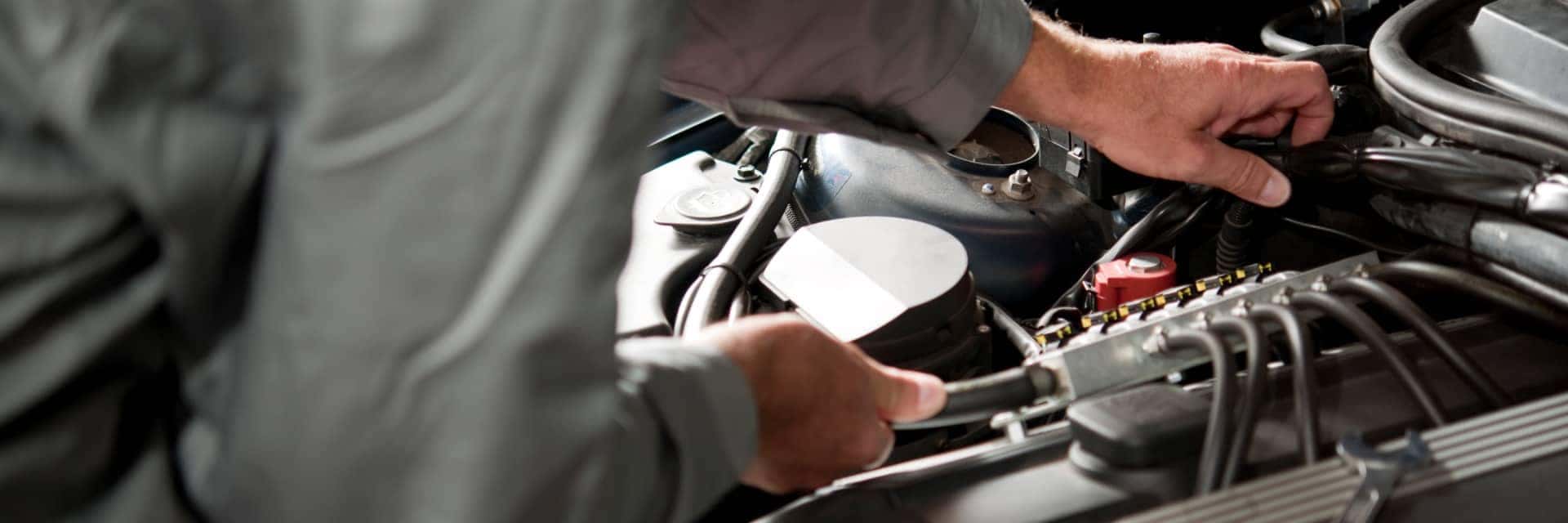 mechanic working on engine