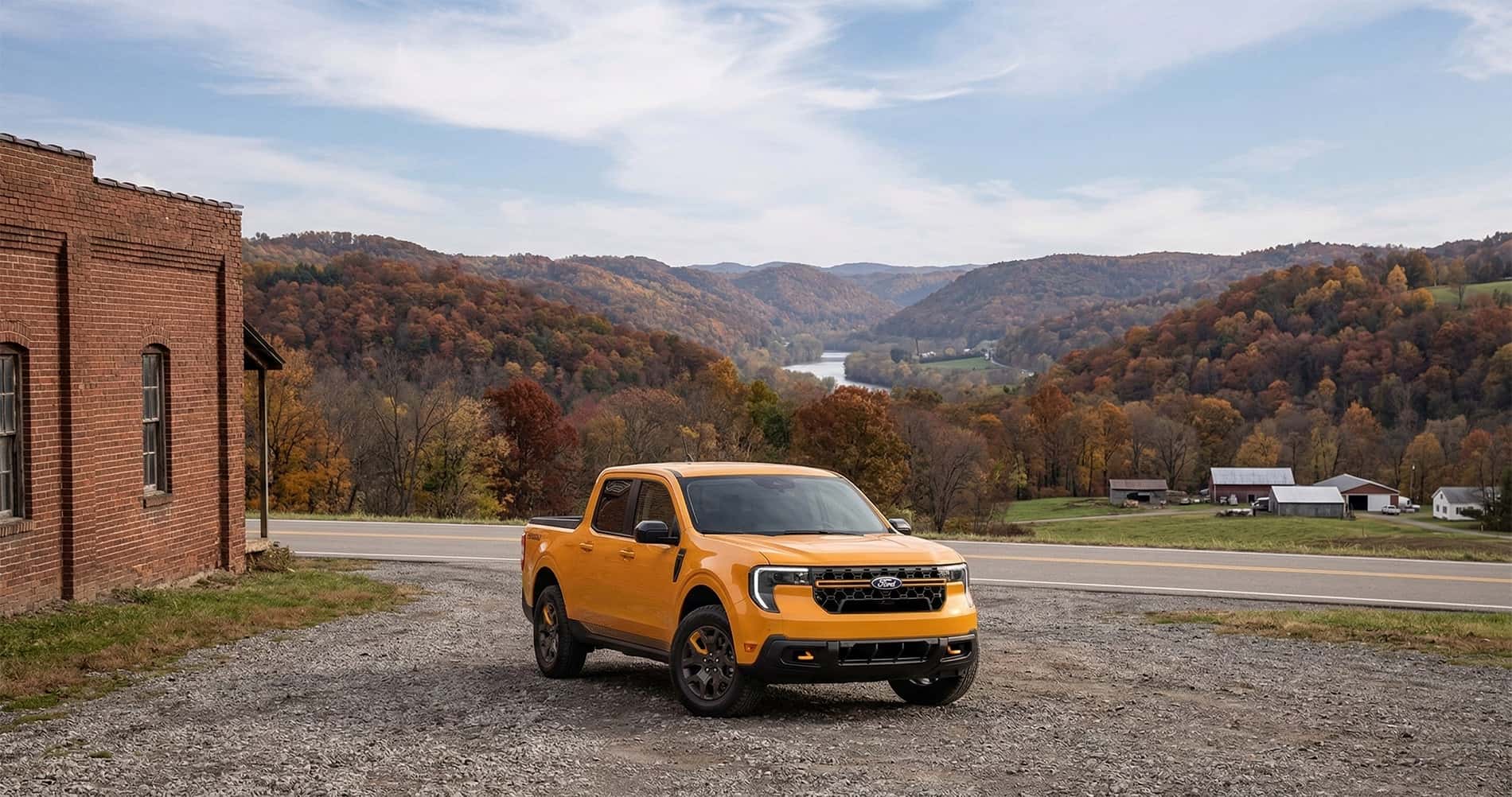 2026 Ford Maverick parked along rural West Virginia road with fall mountain landscape