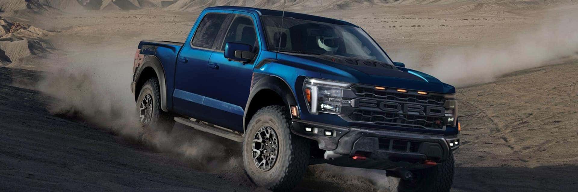 ford f150 driving through dust
