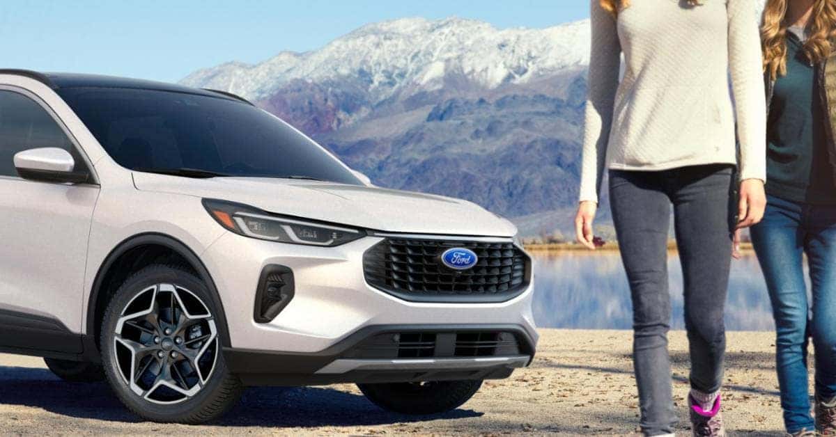 Ford Escape Parked with Women Standing Outside of It