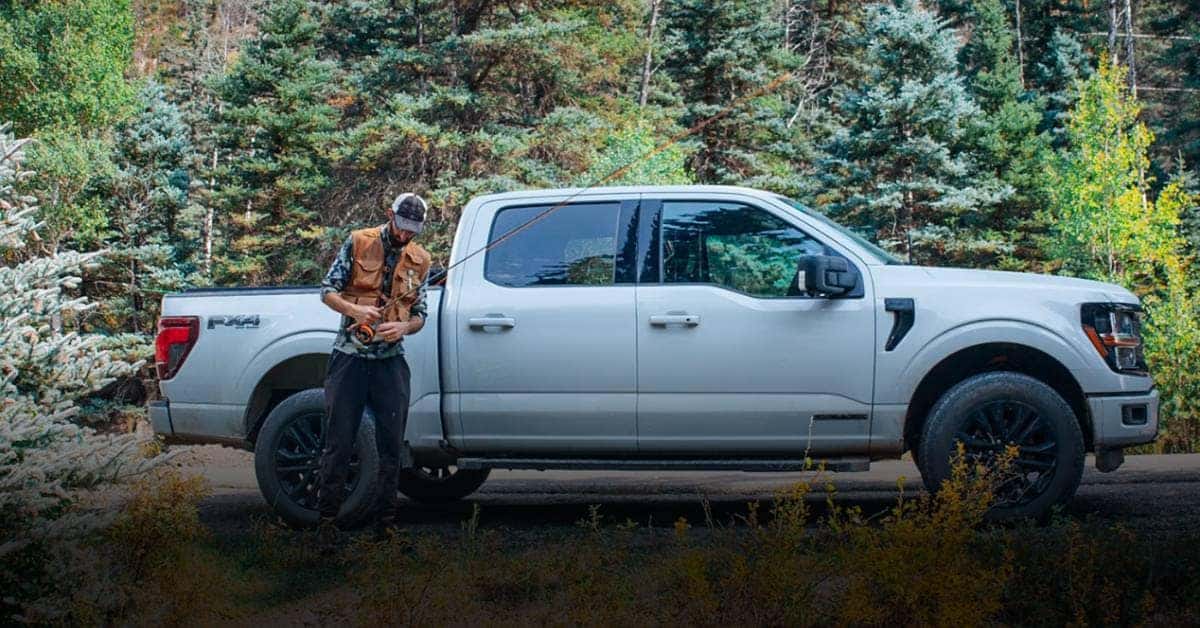 Ford F-150 Parked While a Man Fishes