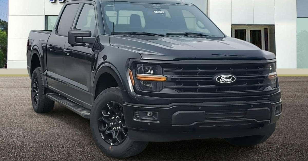 Black Ford truck in front of Varsity Ford dealership in Ann Arbor, MI