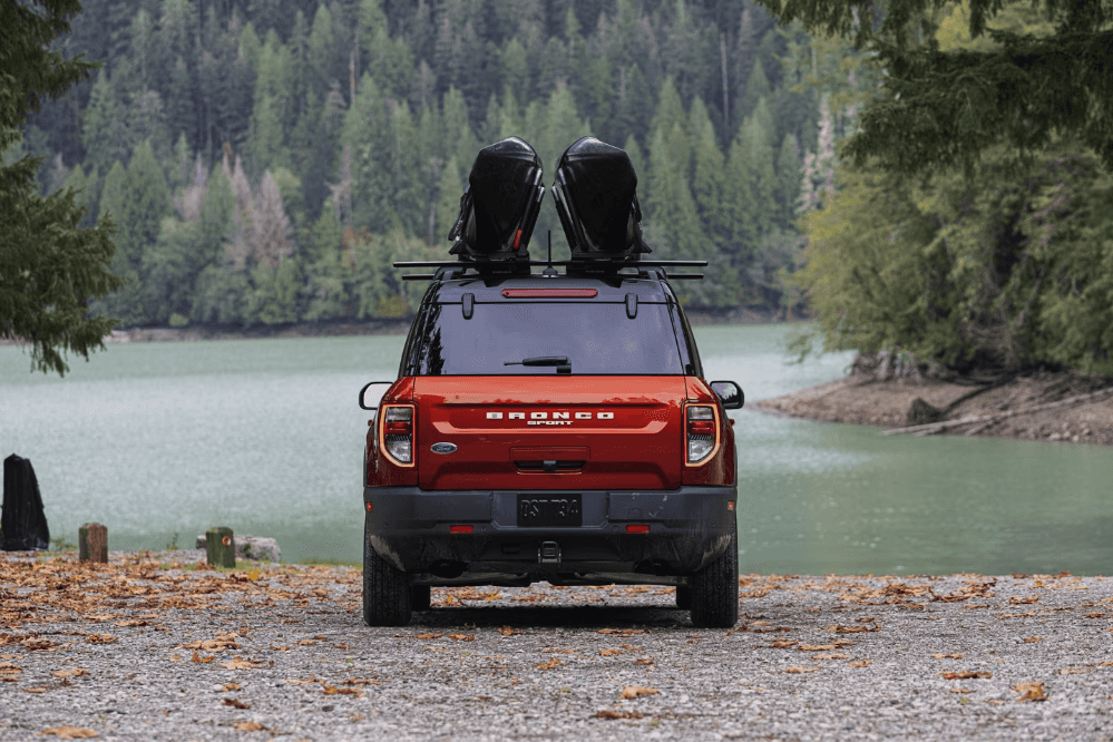 Rear view of the 2024 Ford Bronco Sport in front of a body of water