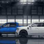 Side profile view of two 2025 Ford Maverick pickup trucks in a garage type setting