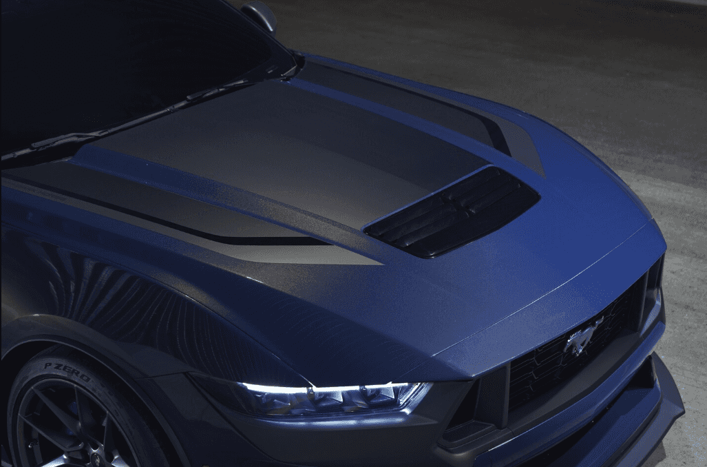 Overhead view of a 2025 Ford Mustang hood, front grille and headlight