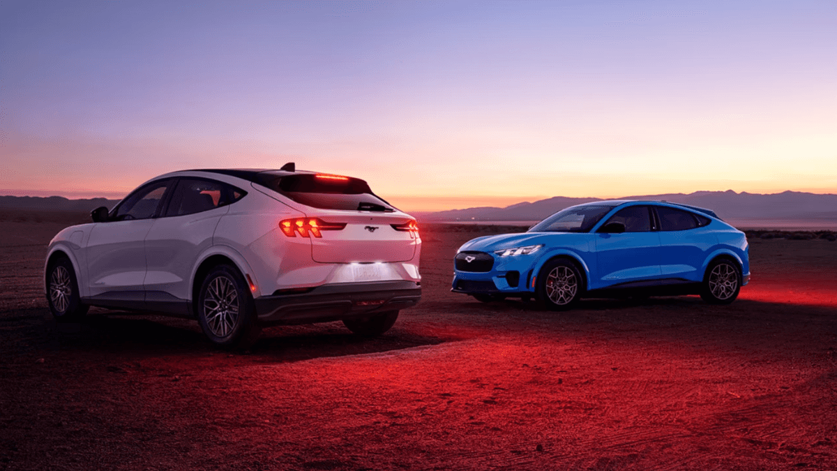 Two 2026 Ford Mustang Mach-E cars in a desert setting