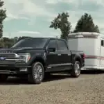 2026 Ford F-150 towing in front of a person and horse
