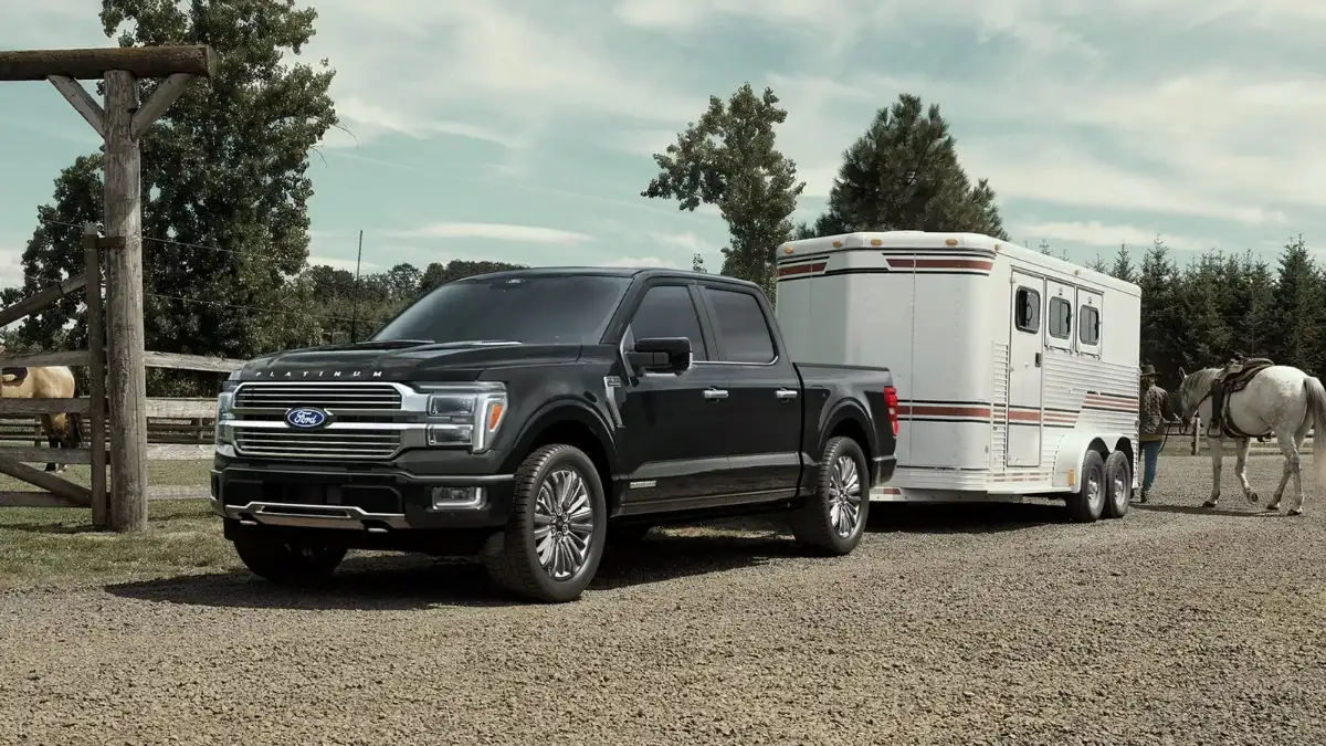 2026 Ford F-150 towing in front of a person and horse