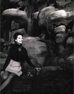 A person sitting on a rock