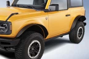 A close up of a yellow car