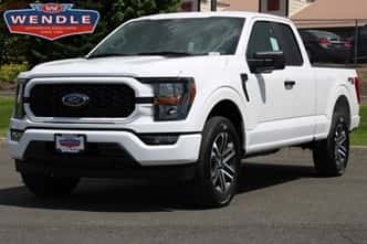 White truck parked on pavement