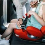A child sitting in a car seat