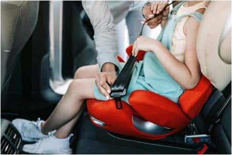 A child sitting in a car seat
