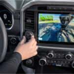 A person using a car stereo