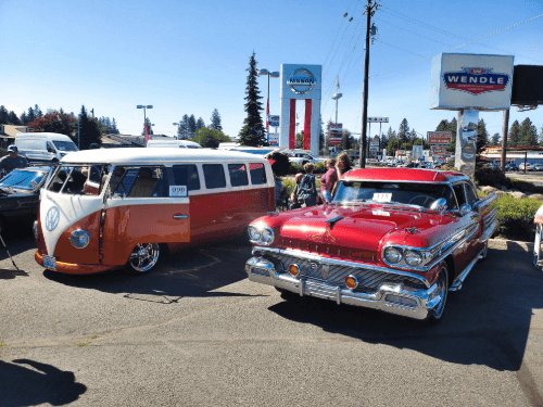 A group of cars parked in a parking lot
