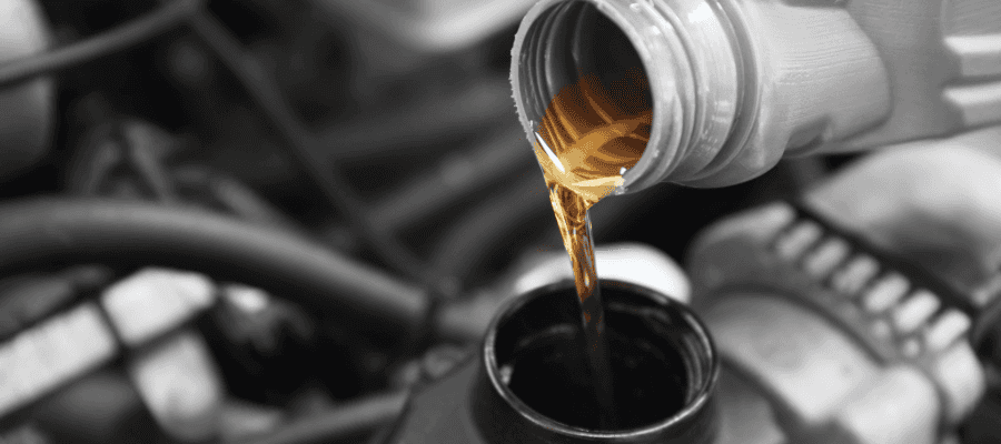 A close-up of a liquid pouring from a bottle