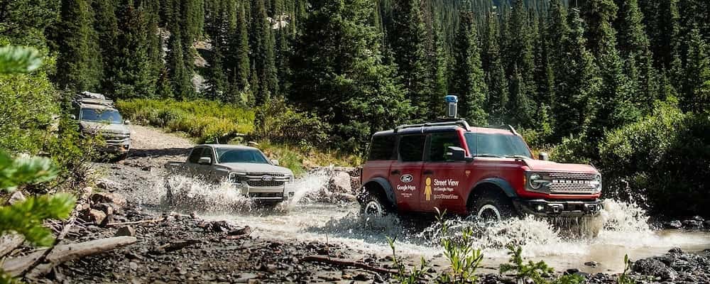 Ford SUVs driving on an off-road trail
