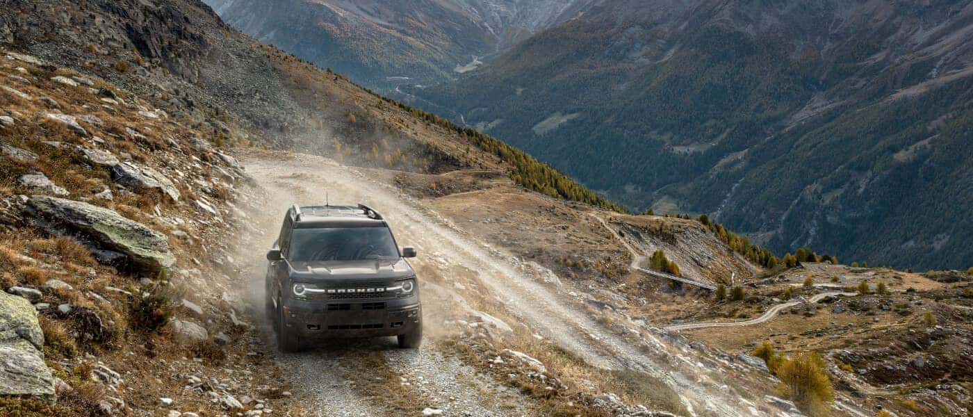 2025 Ford Bronco Exterior Driving Head On Along Elevated Dirt Road