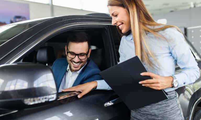 Finance Saleswoman With Customer