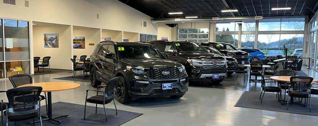 Ford vehicles lined up in the showroom of Westlie Ford in Washougal, WA