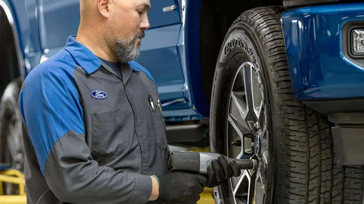Ford service tech servicing a Ford