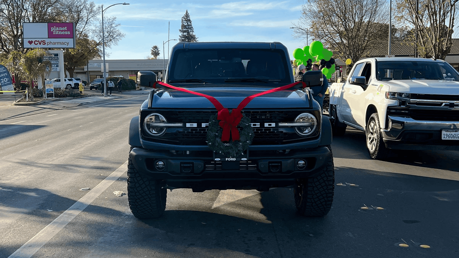 Ford Bronco parked with Christmas wreath